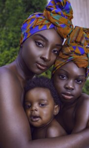 African Mother hugging child